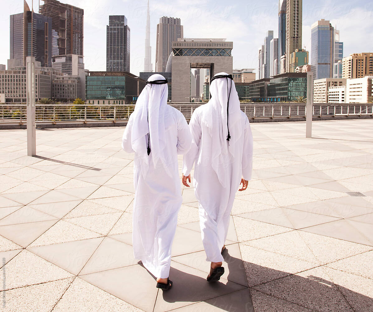 Traditional dressed Arab businessmen. Dubai. U.A.E